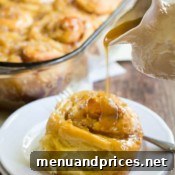 A small image of a baked apple cinnamon roll, symbolizing the end of the recipe.