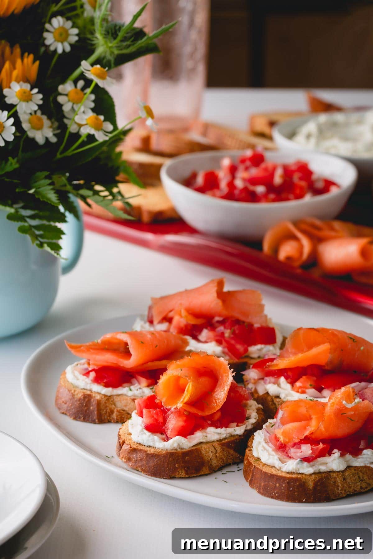 Artisan Smoked Salmon Crostini 2 A beautifully arranged platter of assembled smoked salmon crostini, ready to be served at a party.
