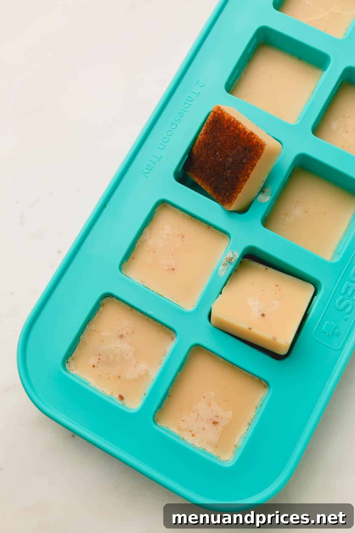 Golden Butter Secrets 6 Solidified browned butter portions neatly placed in 2-tablespoon silicone molds, ready for storage.
