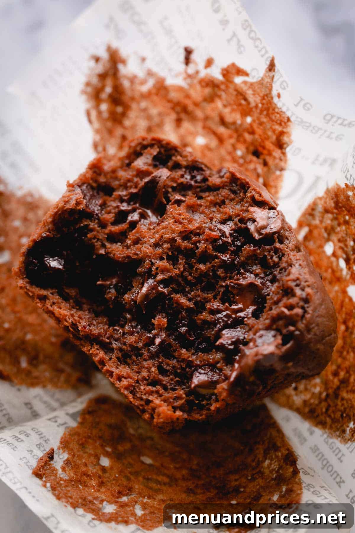 Zesty Orange Chocolate Delights 7 The perfectly baked inside of a chocolate orange muffin, revealing a tender crumb and melted chocolate chips.
