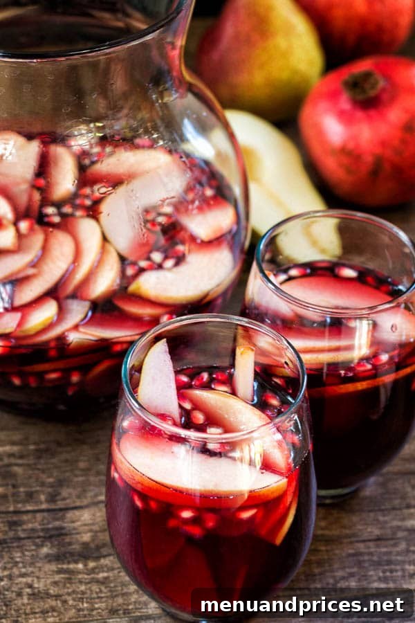 Harvest Sangria 5 My signature Fall Sangria, a delicious red wine drink filled with crisp apples, juicy pears, and vibrant pomegranates, perfect for autumn weekends.