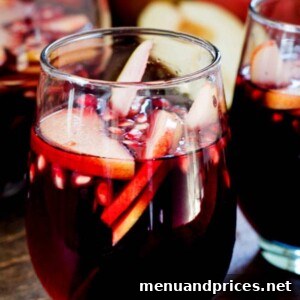 Fall Sangria garnished with autumn fruits