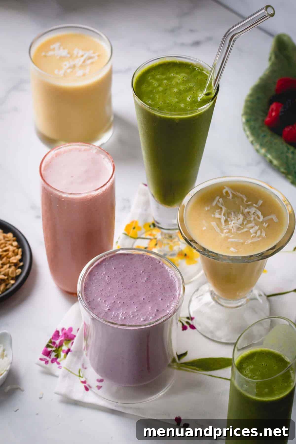 Your Complete Guide to Delicious Smoothies 6 A collection of diverse smoothies, showcasing various colors and ingredients, from vibrant green to rich purple, reflecting a range of healthy beverage options.
