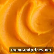 Close up of pineapple curd in a bowl.