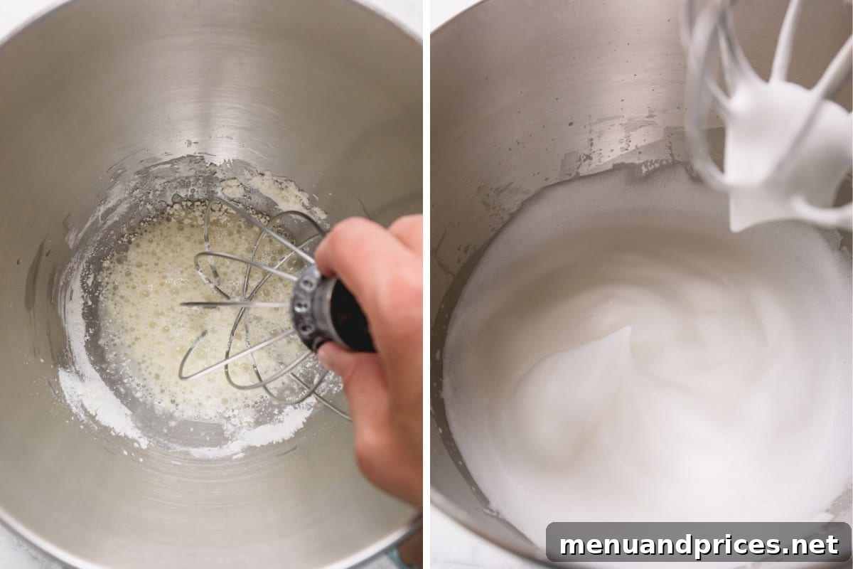 Mastering Royal Icing 5 Whisked meringue mixture forming soft peaks in a stand mixer bowl, ready for the next step.