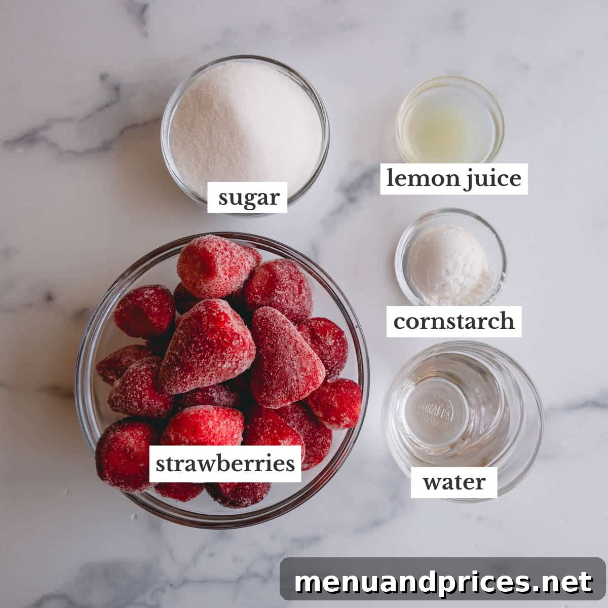 Whip Up Perfect Strawberry Sauce 4 Bowls of frozen strawberries, granulated sugar, fresh lemon juice, cornstarch, and water – all ingredients laid out for making strawberry sauce.
