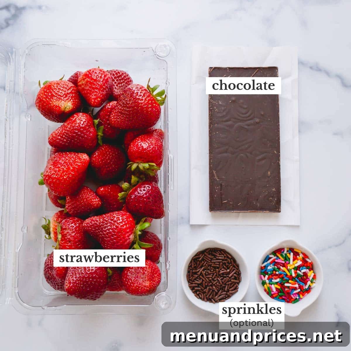 Gourmet Chocolate Strawberries 4 Chocolate, a bar of chocolate, a bowl of chocolate sprinkles, and a bowl of colorful sprinkles.