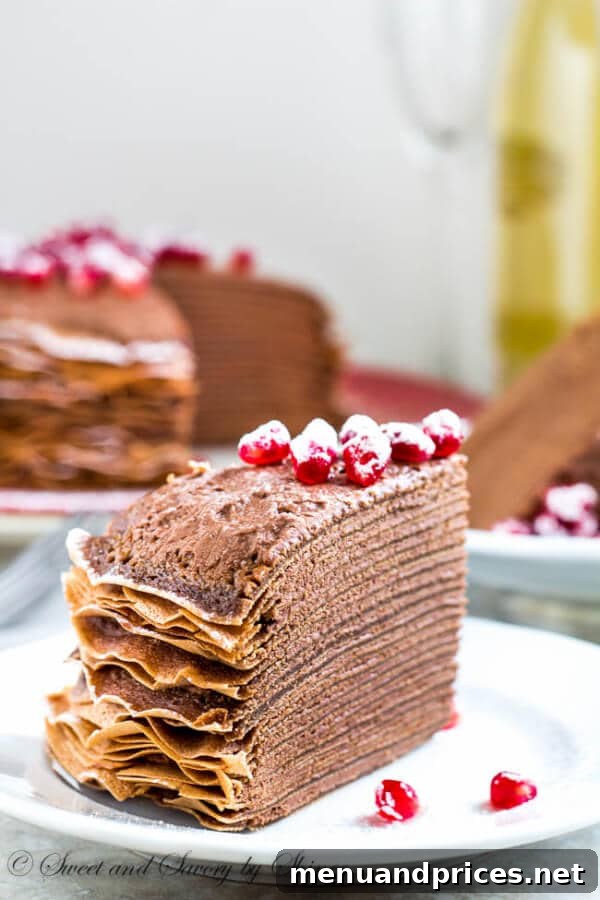 The impressive stack of delicate chocolate crepes, ready to be transformed into a majestic layered cake with rich chocolate mousse.