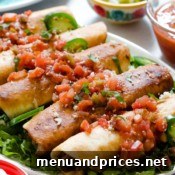 A plate of golden-brown, crispy leftover pulled pork flautas, adorned with fresh pico de gallo, inviting diners to enjoy.