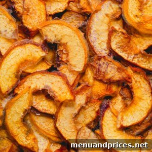 Close up image of beautifully dehydrated peaches in a bowl.