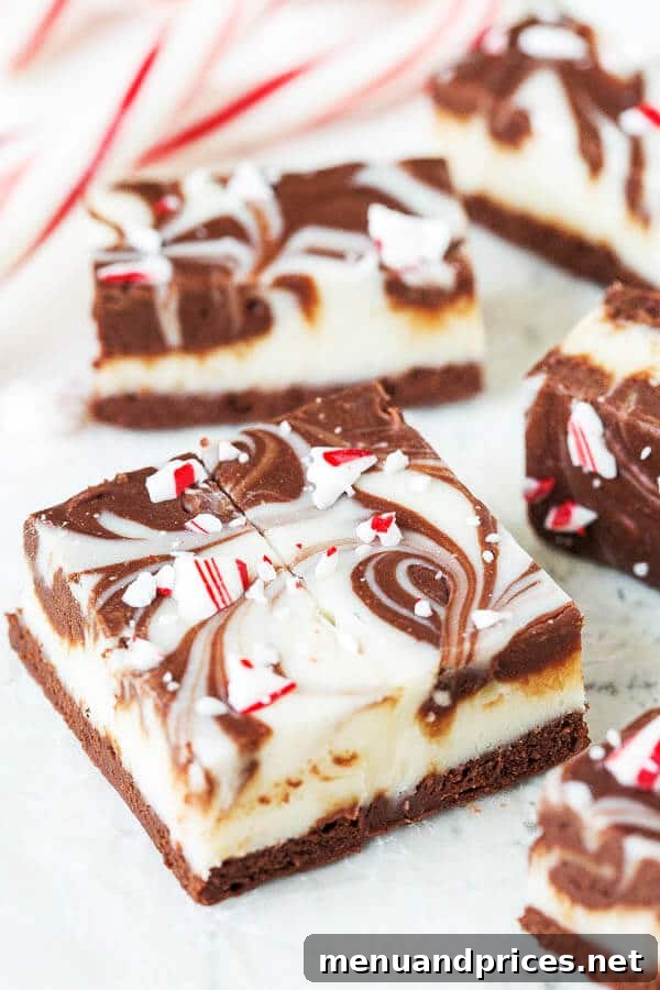 Festive Double Chocolate Peppermint Fudge 4 Close-up of decadent double chocolate peppermint fudge, showcasing the rich layers and crushed candy cane topping.