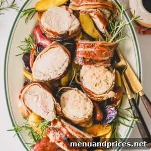 A platter of pieces of bacon wrapped pork tenderloin.