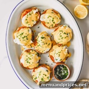 The Ultimate Eggs Benedict with Handcrafted Hollandaise 11 A platter of Eggs Benedict, ready for serving.