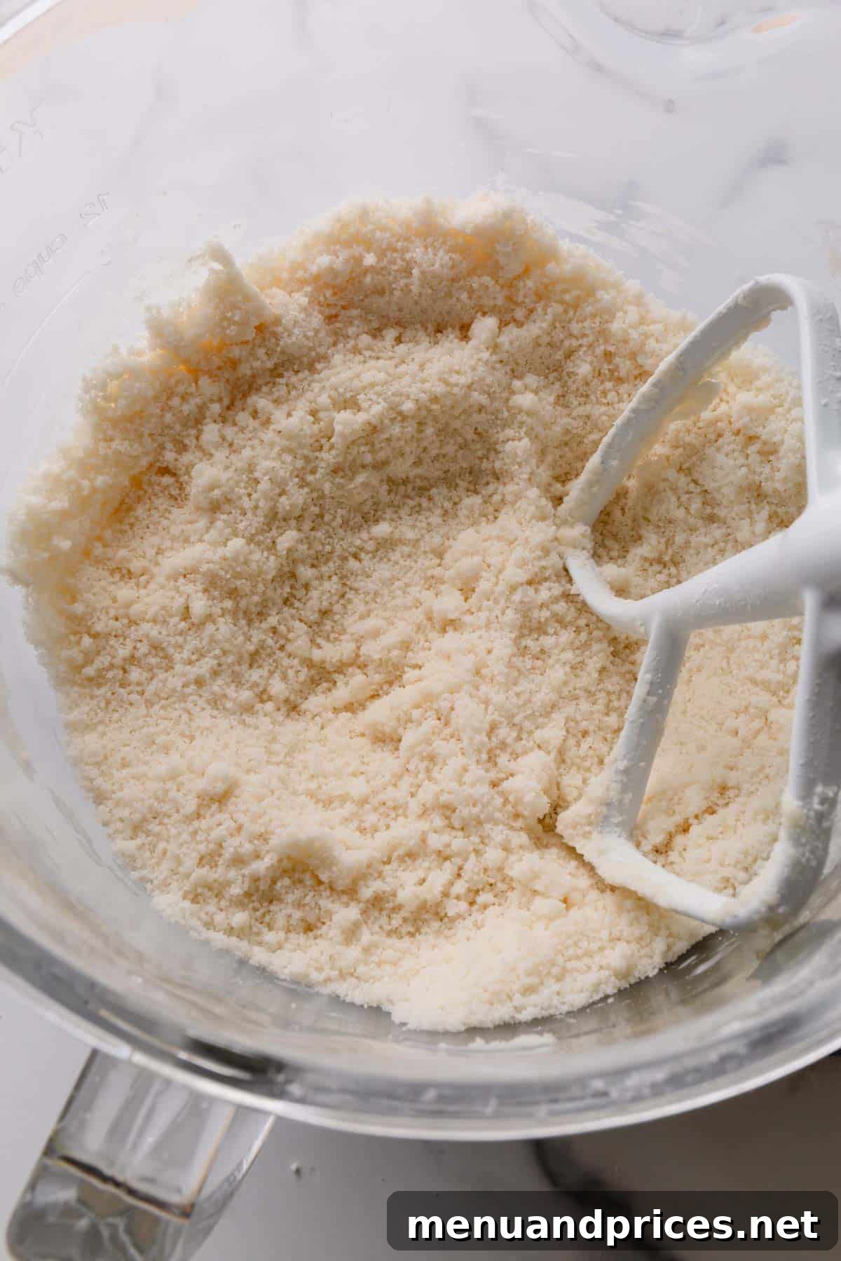 Fluffy White Cake Perfection 8 Dry ingredients for white cake batter perfectly mixed in a bowl, showing the characteristic wet sand texture.