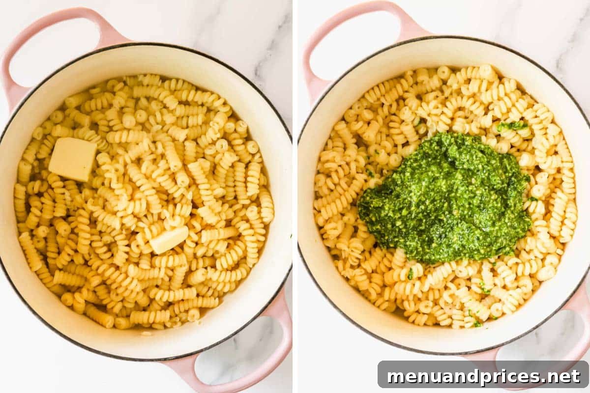 Cooked pasta in a pot with butter on the left and pesto on top of the buttered pasta on the right.