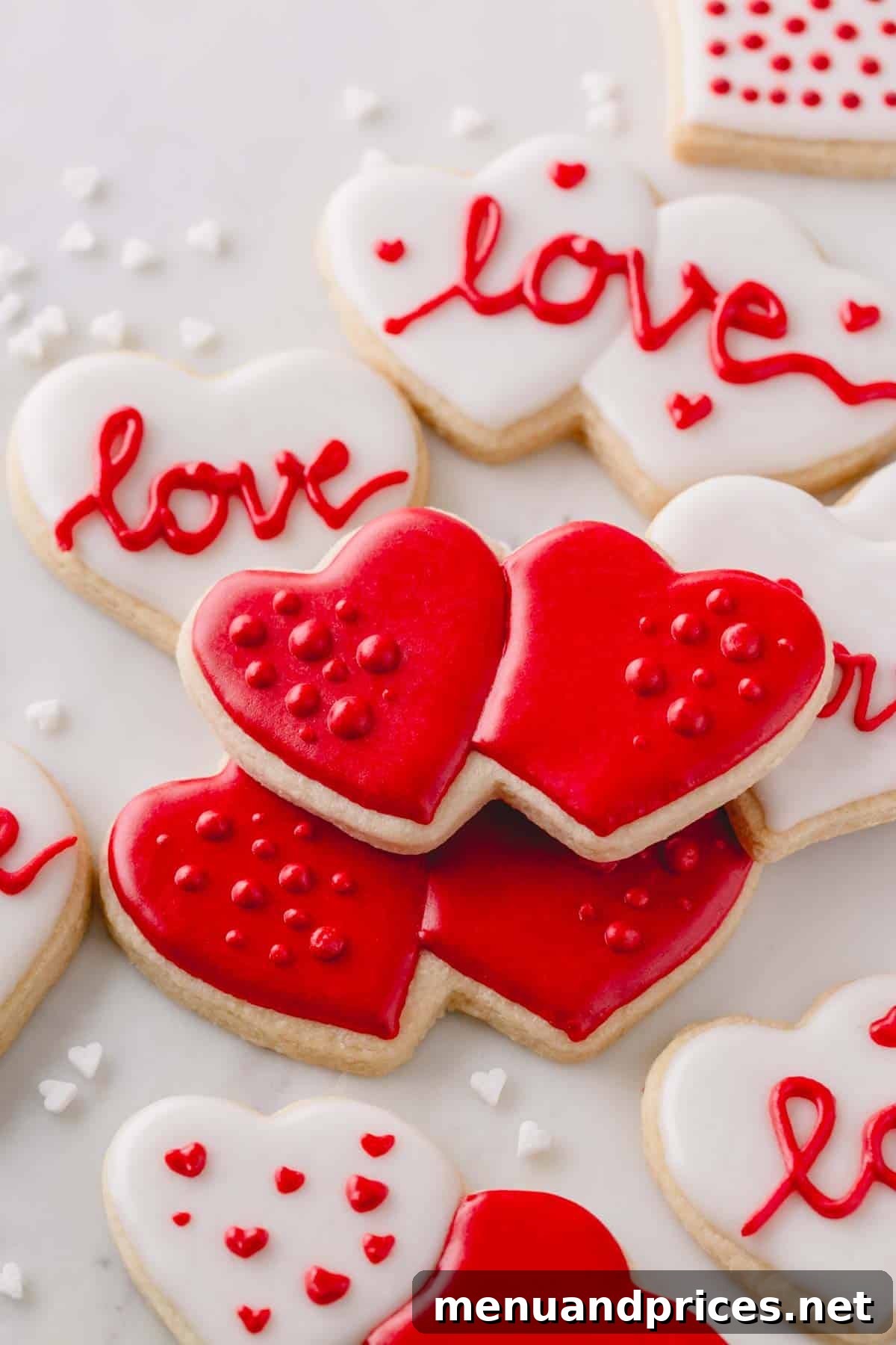 Sweetheart Sugar Cookie Delights 8 Heart-shaped Valentine's Day sugar cookies with red and white icing.