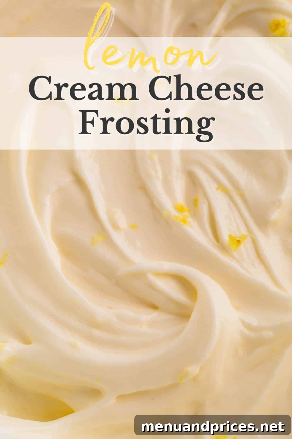 Thick lemon cream cheese frosting piped onto a vibrant yellow cake.