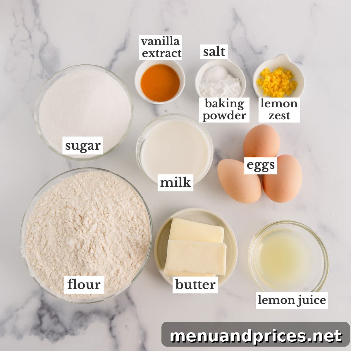 Sunshine Lemon Sheet Cake 4 A collection of fresh, high-quality ingredients, including lemons, eggs, butter, flour, and sugar, meticulously laid out on a kitchen counter, ready to be transformed into a delicious lemon sheet cake.