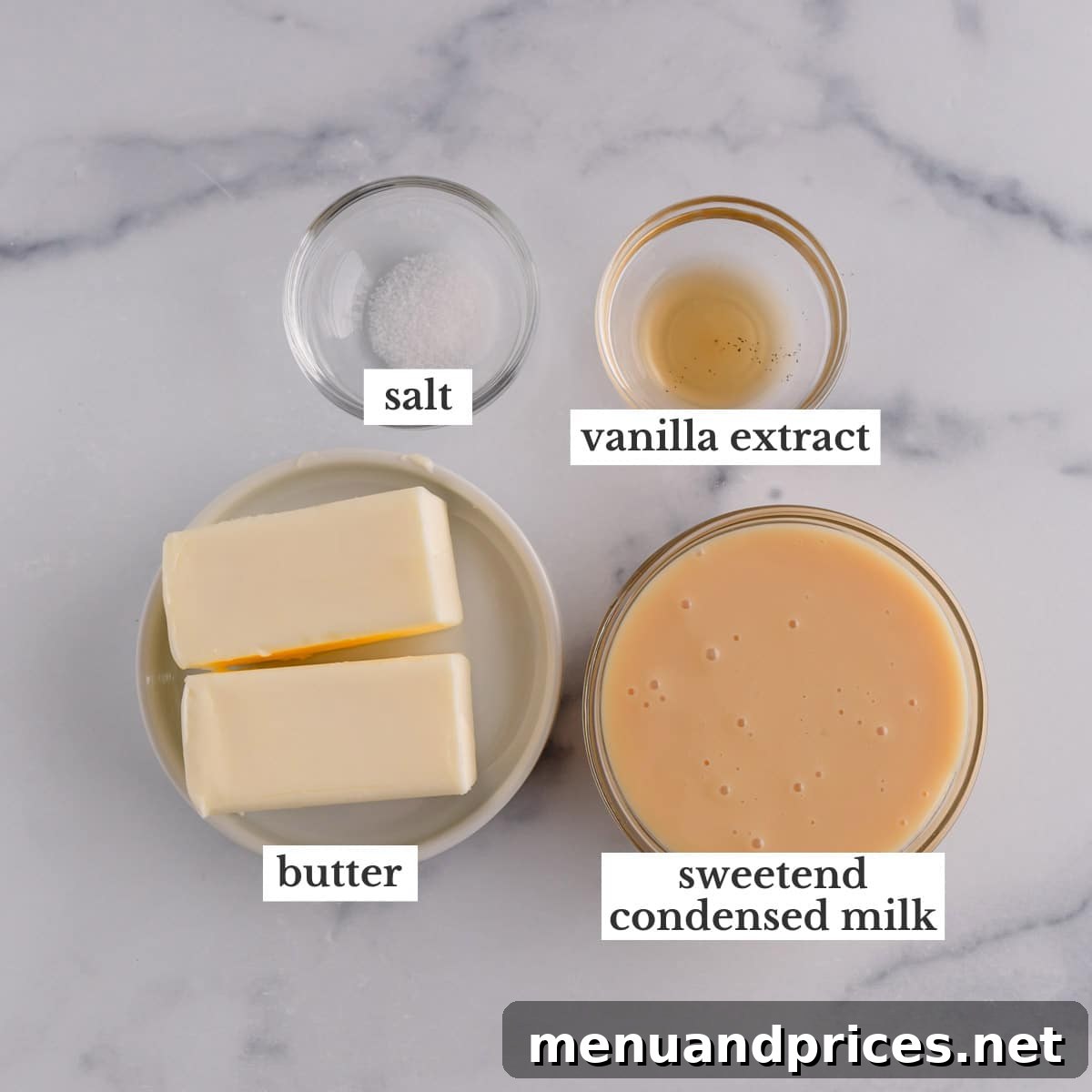 Classic Vanilla Russian Buttercream 4 Arrangement of key ingredients: coarse kosher salt, creamy unsalted butter, rich sweetened condensed milk, and pure vanilla extract, perfectly portioned and ready for baking.