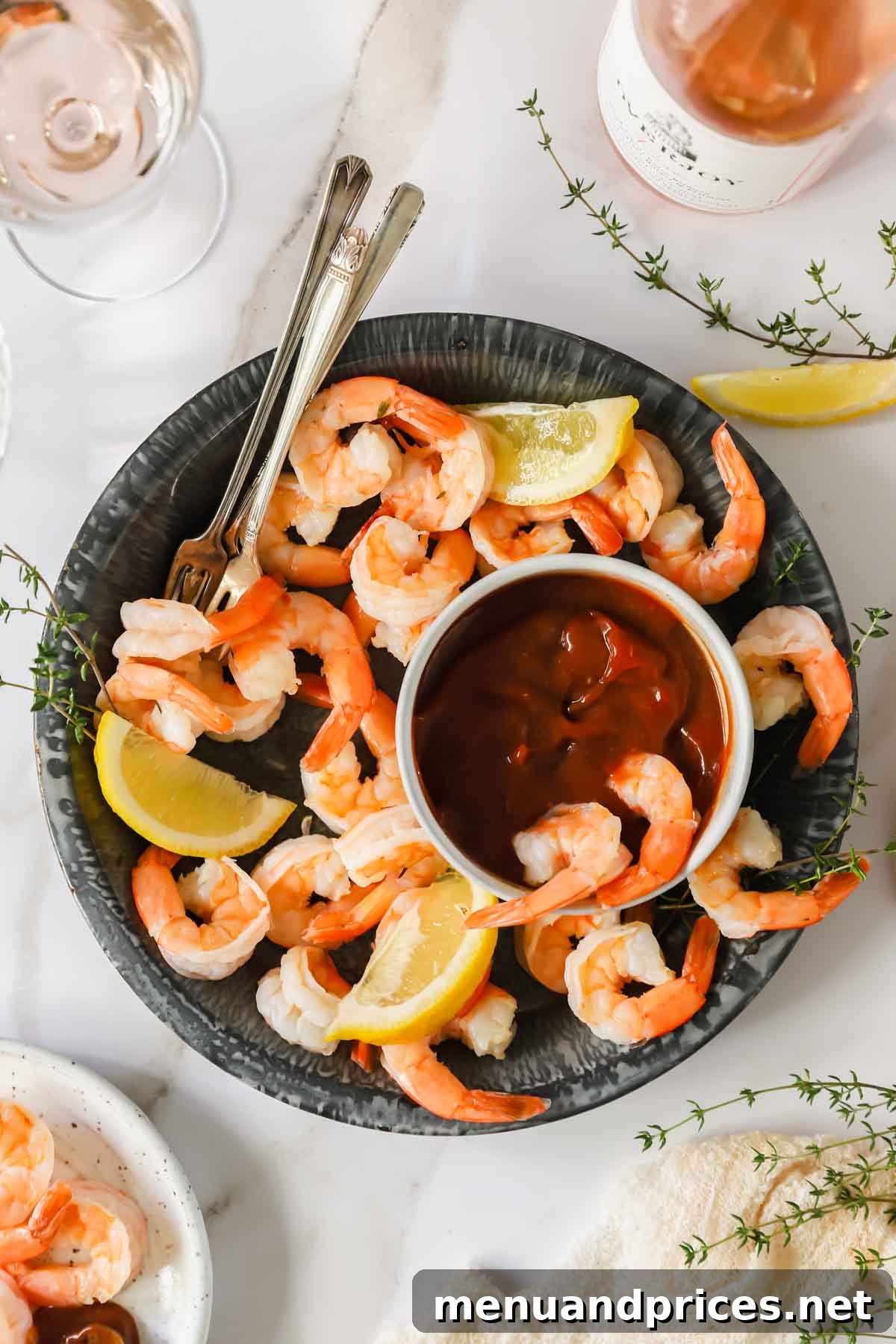 Zesty Prawn Cocktail 8 A beautiful close-up of a shrimp cocktail platter, with succulent shrimp, vibrant cocktail sauce, and fresh lemon, ready for serving.