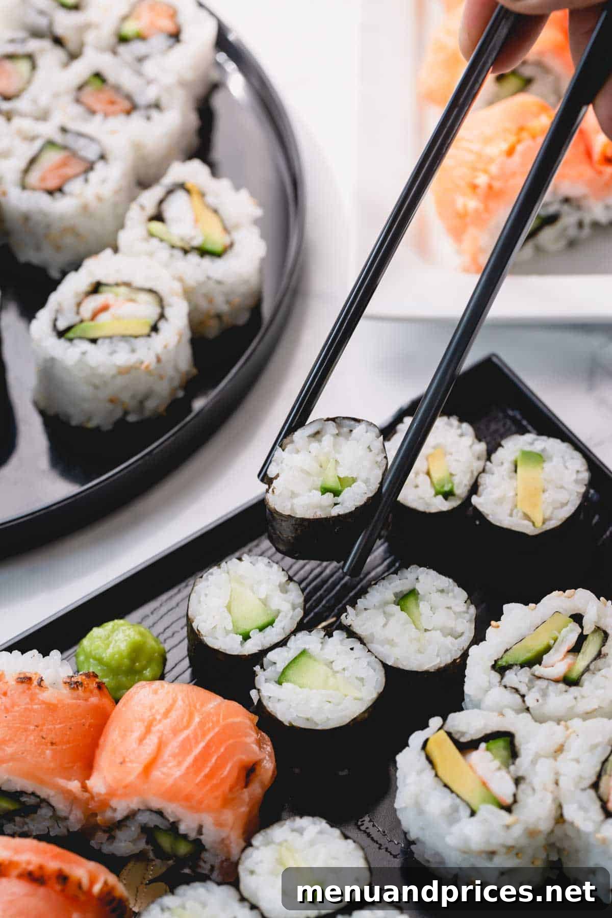 Crafting Delicious Sushi at Home 3 Close-up of freshly made cucumber sushi rolls, with one piece being picked up by chopsticks.