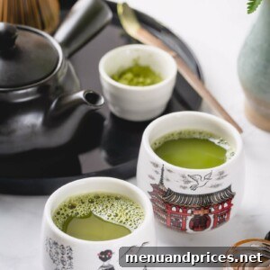 A simple, comforting cup of matcha tea in a white mug.