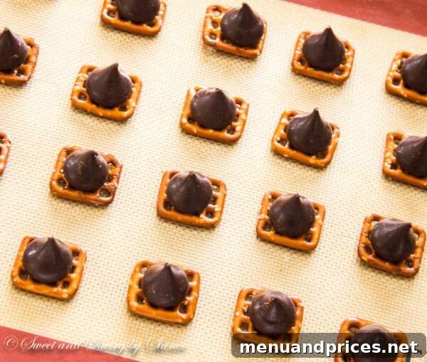 Goldfish Chocolate Crunchies 4 Step-by-step image of making chocolate Goldfish cracker bites, showing pretzels, chocolate, and crackers.