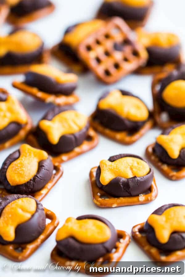 Goldfish Chocolate Crunchies 5 A festive pile of chocolate Goldfish cracker bites on a white plate, perfect for sharing.