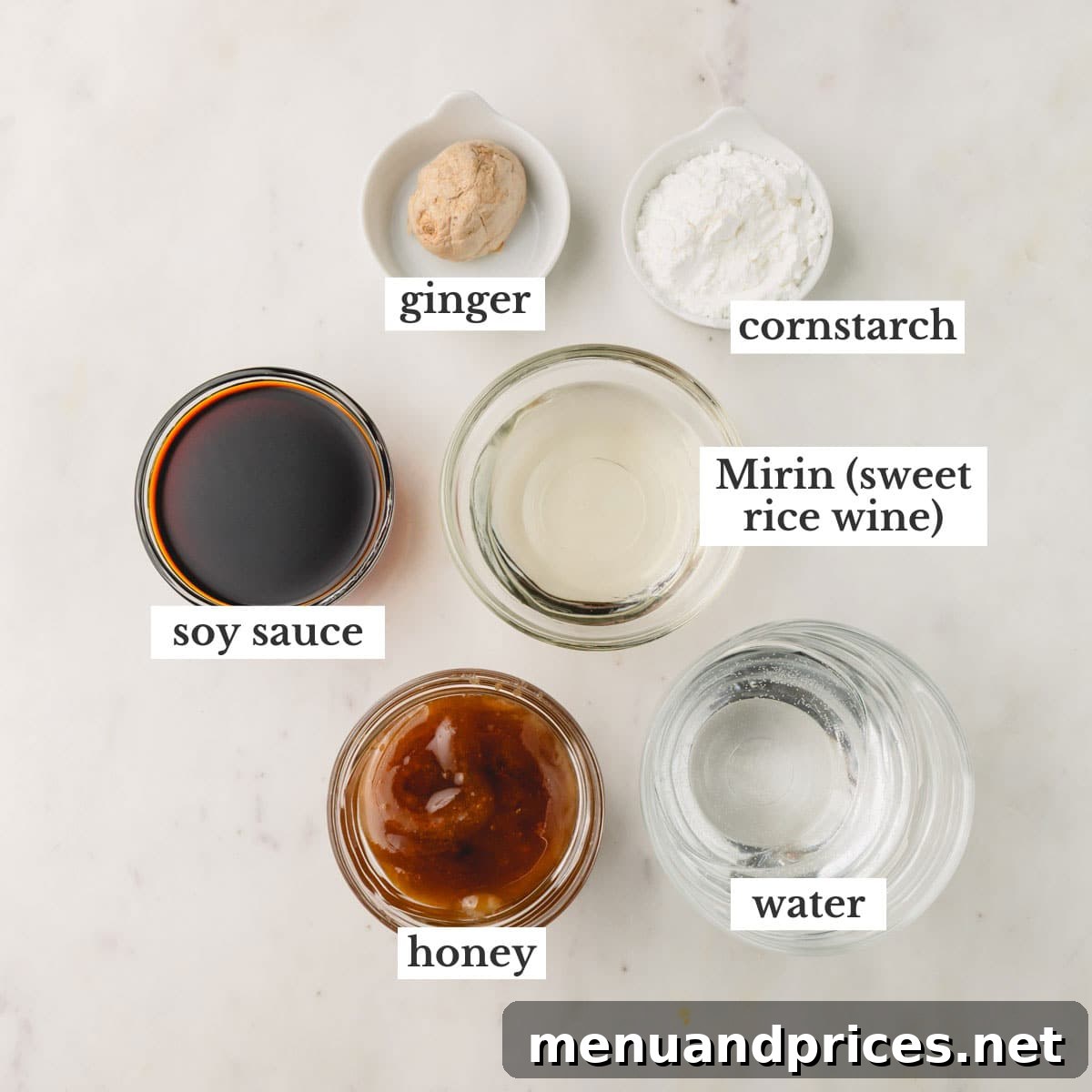 Sticky Honey Teriyaki 5 Individual bowls holding key ingredients: soy sauce, fresh ginger, cornstarch, mirin, water, and golden honey.