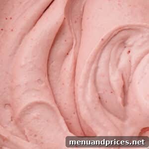 Strawberry Cheesecake Frosting 10 Strawberry cream cheese frosting with flecks of freeze-dried strawberries, presented beautifully in a bowl.
