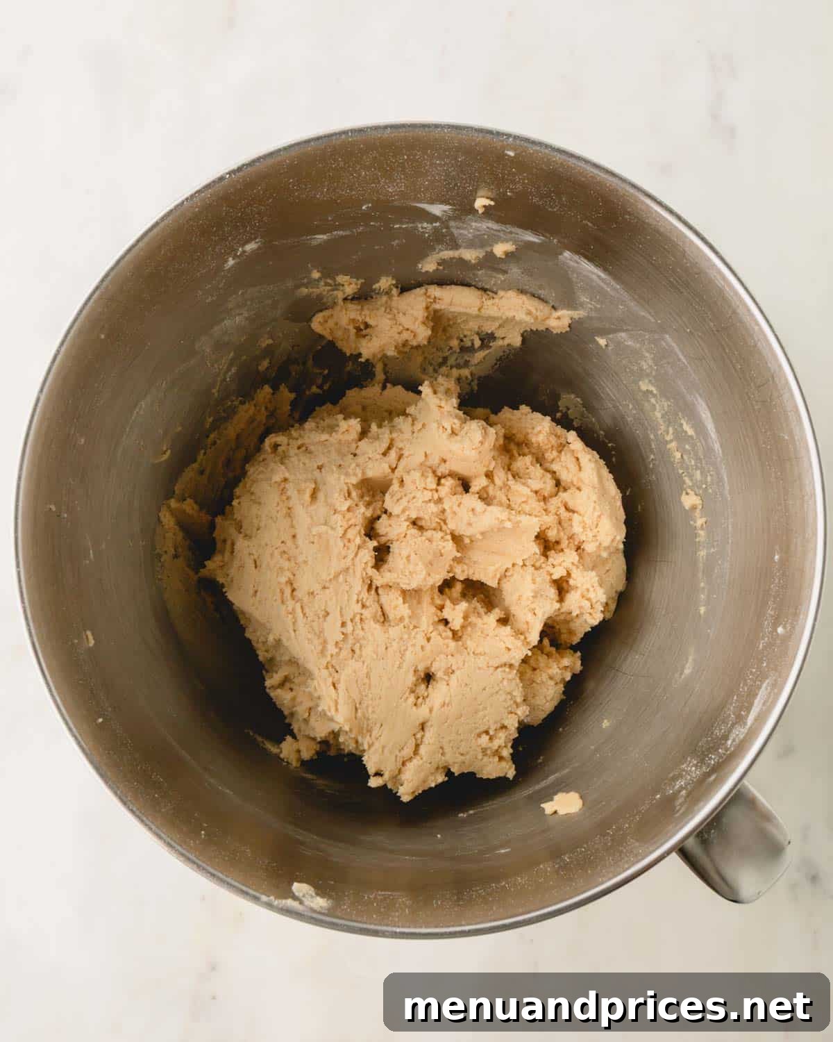Decadent Thick and Chewy Chocolate Chip Cookies 11 A bowl of perfectly mixed cookie dough, just combined.