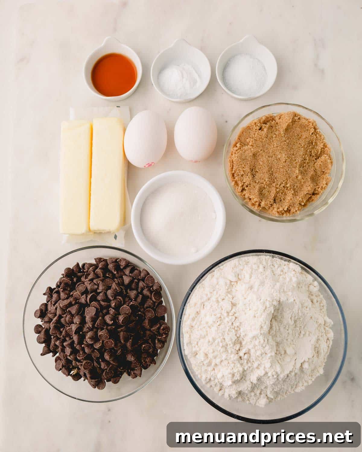 Decadent Thick and Chewy Chocolate Chip Cookies 5 All the essential ingredients neatly arranged to make thick and chewy chocolate chip cookies.