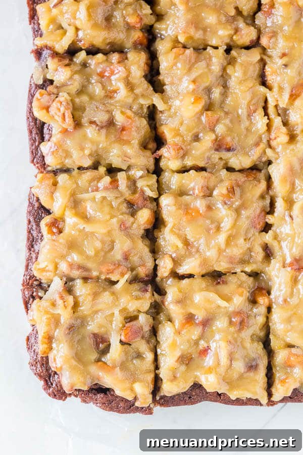 Decadent German Chocolate Brownie Bliss 3 Close-up of a German Chocolate Brownie, showcasing the rich, fudgy texture and a generous layer of coconut-pecan frosting.