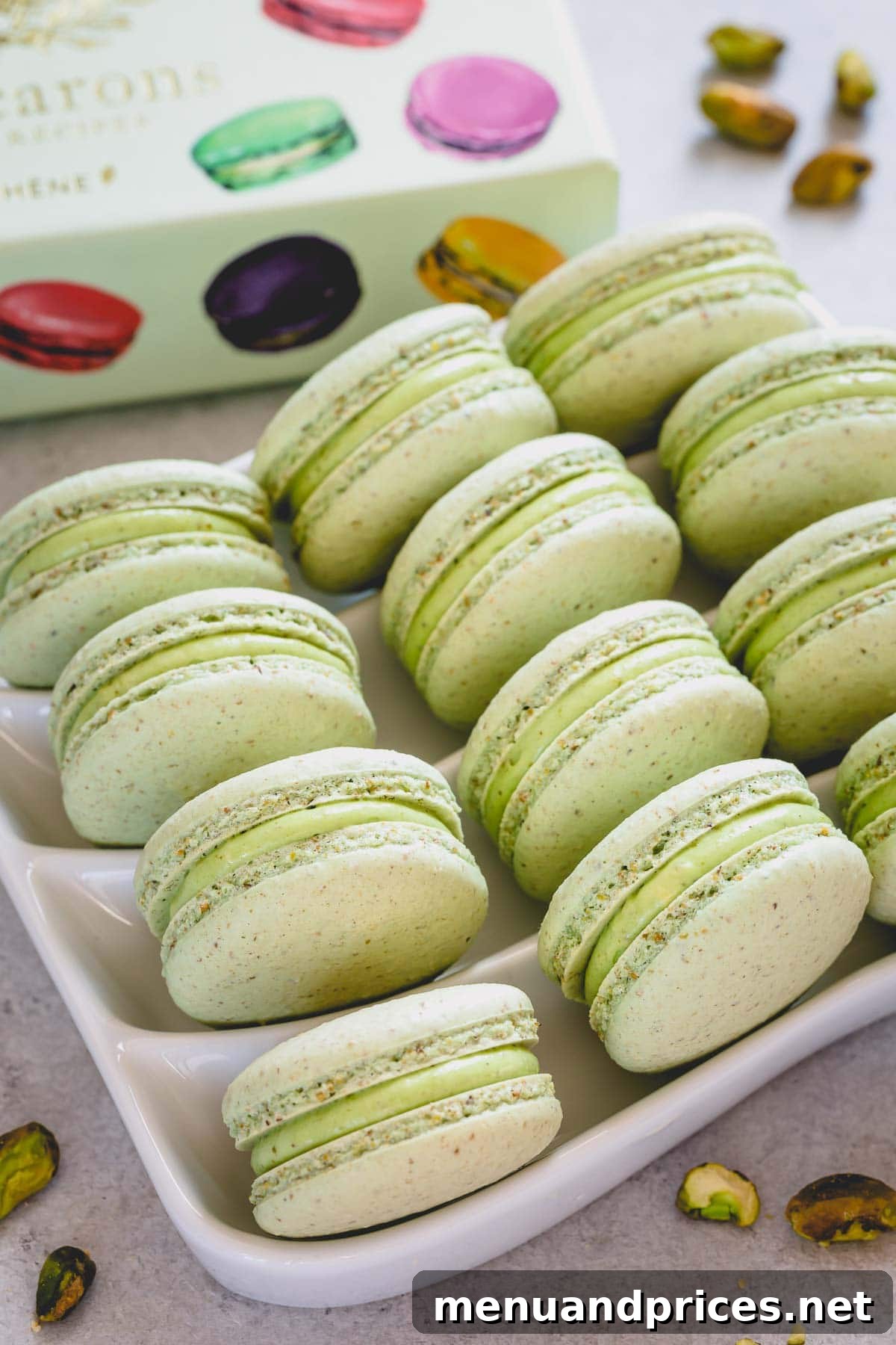 Heavenly Pistachio Macarons 3 A stunning close-up of pistachio macarons elegantly arranged on a serving plate, showcasing their delicate texture and vibrant color.