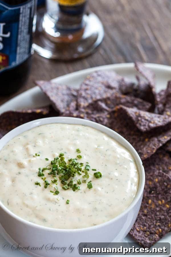 Hoppy Cheddar Melting Pot 2 Creamy homemade beer cheese dip ready for serving