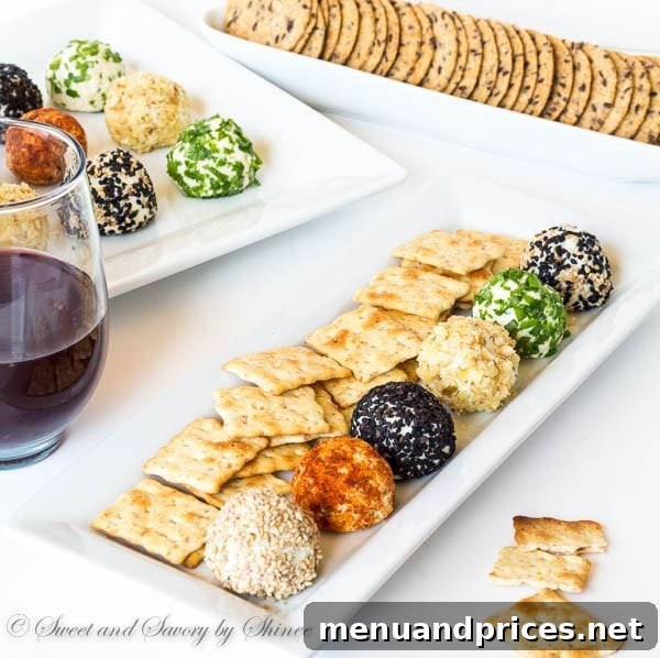 Bite-Sized Cheesy Delights 2 A festive platter of colorful mini cheese balls coated in paprika, finely chopped scallions, walnuts, and sesame seeds, beautifully arranged and ready to serve as an easy make-ahead appetizer for any party.