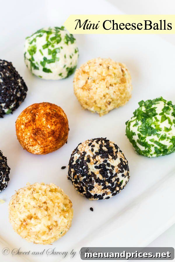 Bite-Sized Cheesy Delights 3 A close-up shot showcasing three distinct mini cheese balls, featuring different vibrant coatings: one in rich paprika, another in fresh, finely chopped green scallions, and a third in a mix of black and white toasted sesame seeds, highlighting their varied textures.
