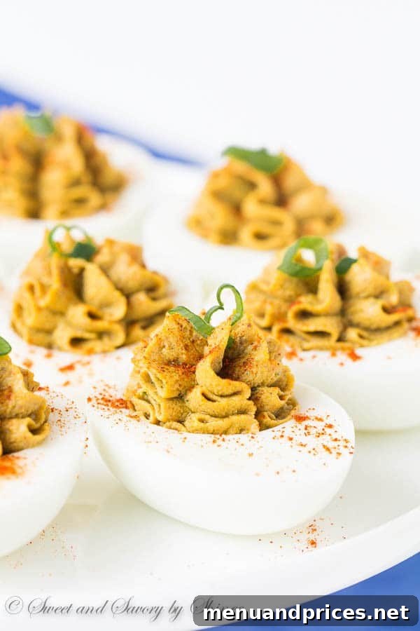 Gourmet Chicken Liver Pate Deviled Eggs, beautifully plated as an impressive appetizer.