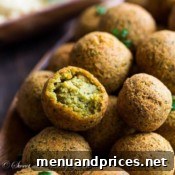Freshly fried falafel balls in a bowl, ready to be served.