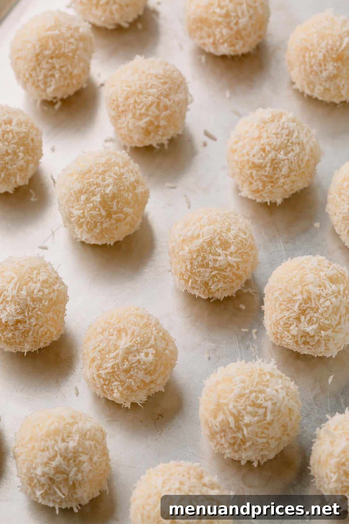Almond Coconut Delights 12 Desiccated coconut covered coconut balls.