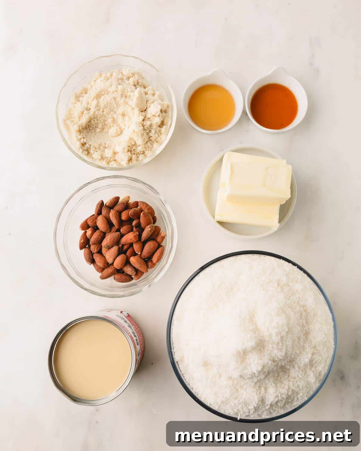 Almond Coconut Delights 4 Almond flour, whole pecans, condensed milk, desiccated coconut, butter, vanilla extract, and maple syrup.