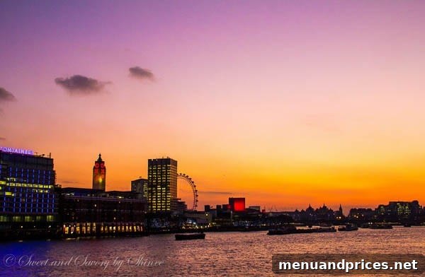 London Visual Diary 28 A beautiful sunset over the Thames River in London, with reflections on the water.