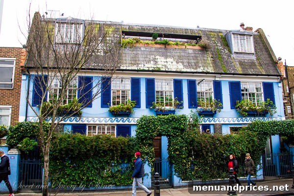 London Visual Diary 7 Colorful houses lining a street in Notting Hill, showcasing its iconic charm.