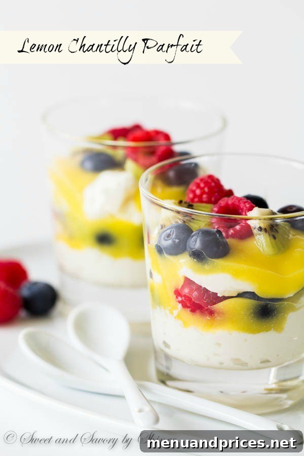 Whipped Lemon Delight 3 Close-up view of a fruity Chantilly parfait, showcasing the intricate layers of fluffy cream, zesty lemon curd, and fresh berries