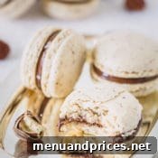 Another image of a chocolate hazelnut macaron, showcasing its delicate texture.