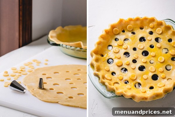 A close-up of a pie crust decorated with charming polka dots, created using a piping tip, illustrating an easy and effective way to adorn a pie.