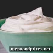 A smaller image of homemade yogurt whipped cream, emphasizing its creamy texture.