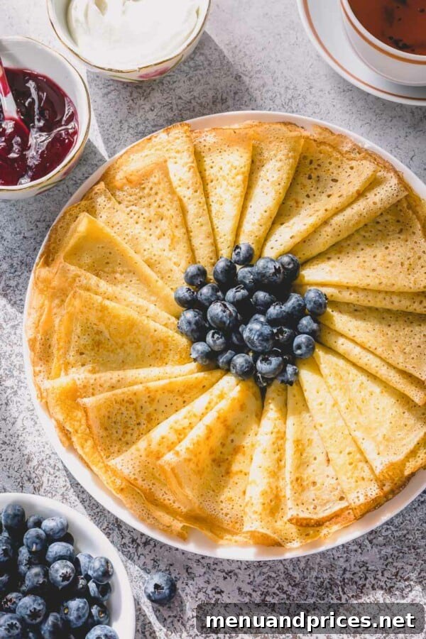 Whip Up Delicious Crepes 2 Stack of perfectly cooked, golden brown crepes