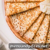 Crepes with fruit and whipped cream