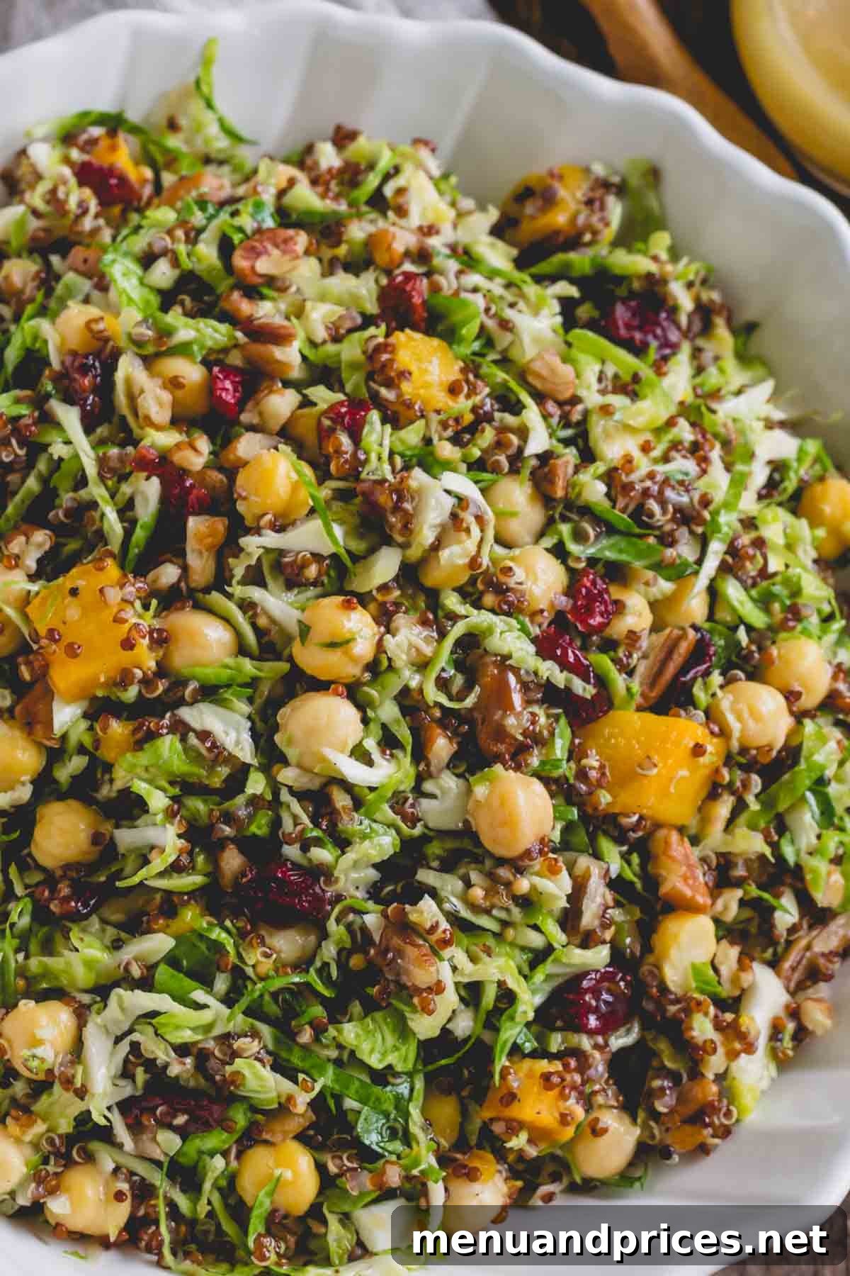 Roasted Brussels Quinoa Harvest Bowl 8 Up-close view of the warm quinoa Brussels sprouts salad with chickpeas, highlighting the textures.